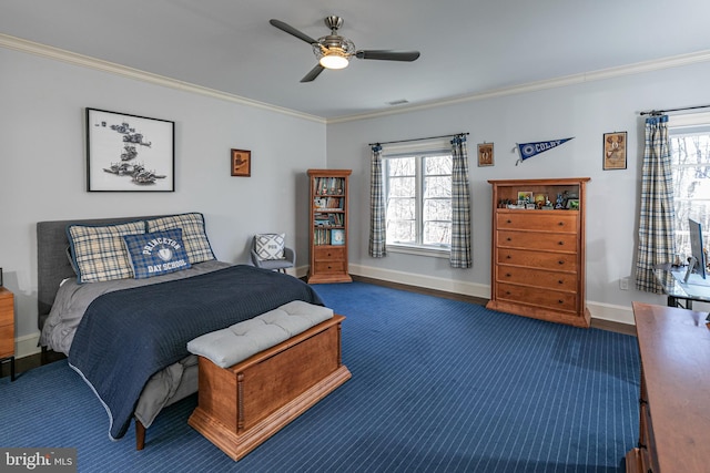 bedroom featuring ceiling fan, ornamental molding, multiple windows, and baseboards