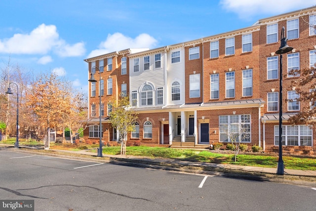 view of front of property with brick siding