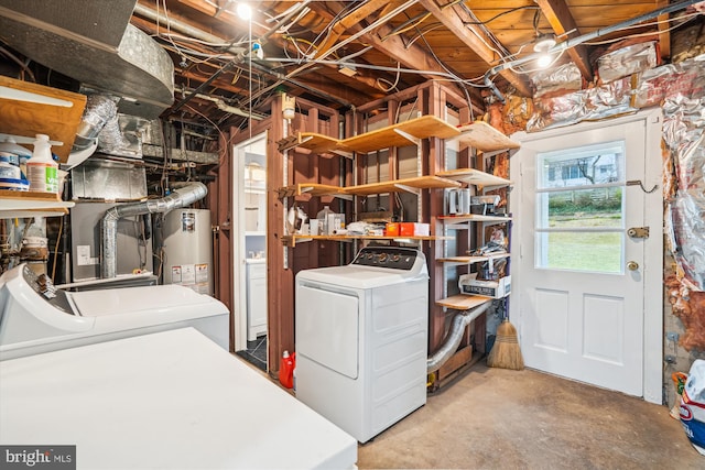 interior space with gas water heater and washing machine and dryer