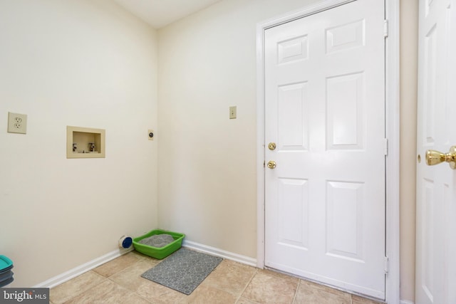 washroom with electric dryer hookup, baseboards, washer hookup, and laundry area