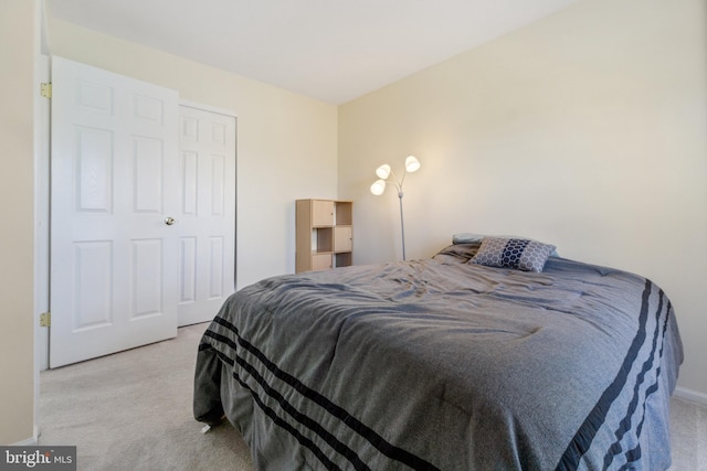 bedroom featuring carpet