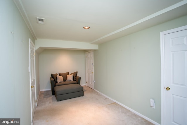 sitting room with recessed lighting, baseboards, visible vents, and light carpet