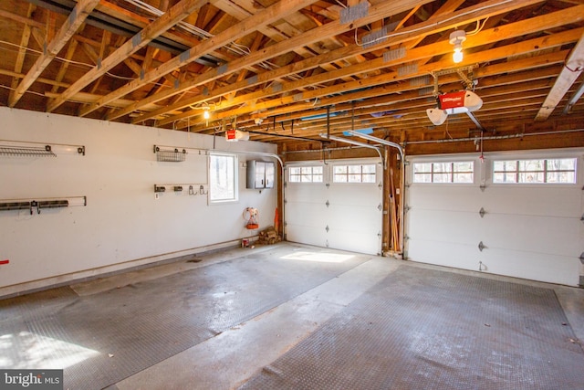 garage featuring a garage door opener