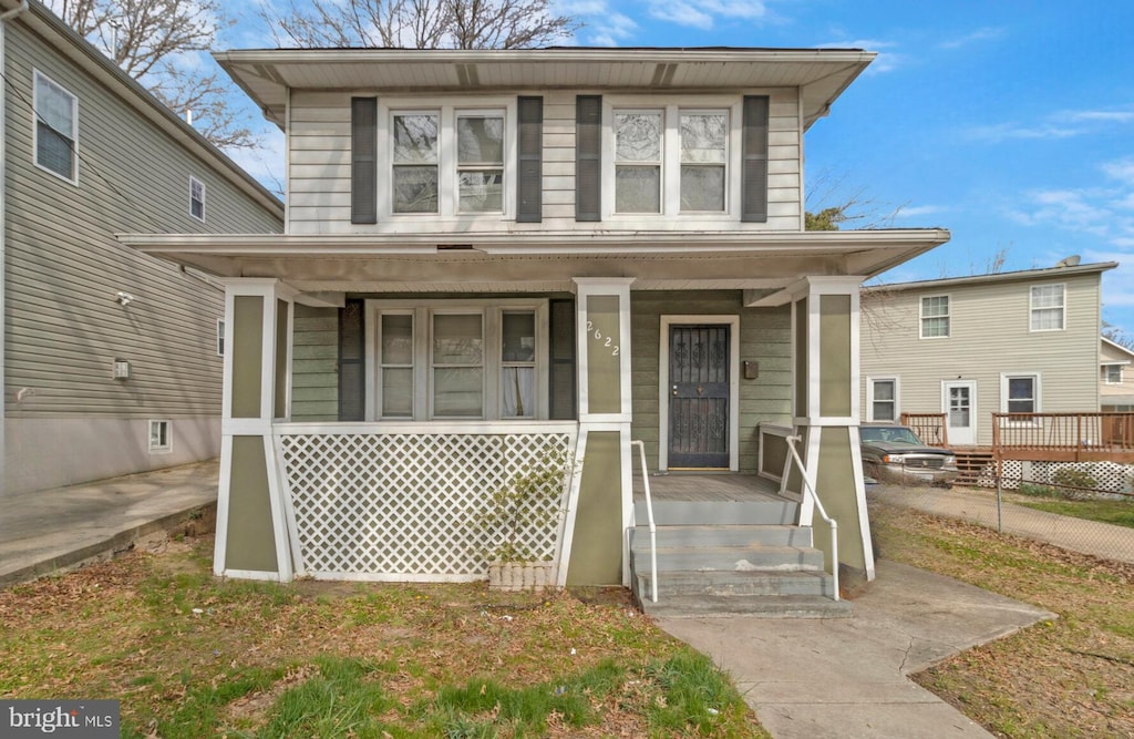 traditional style home with a porch