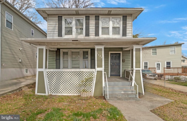 traditional style home with a porch