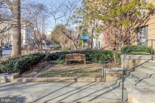 view of community with fence