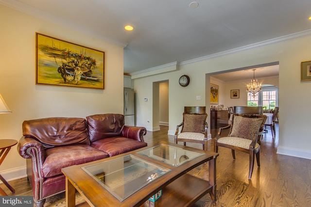 living room featuring dark wood finished floors, a chandelier, crown molding, and baseboards