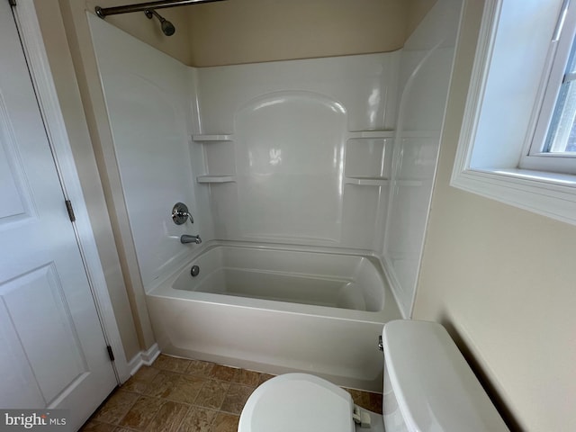 full bath with bathtub / shower combination and toilet