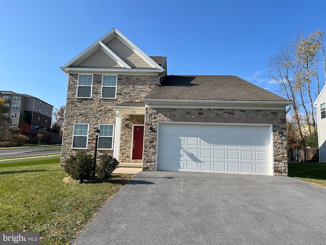 view of front of property featuring a garage, aphalt driveway, a shingled roof, and a front yard