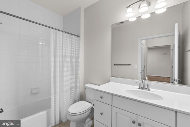 bathroom featuring toilet, visible vents, shower / tub combo with curtain, and vanity