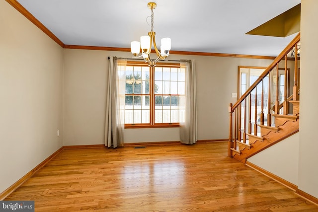 interior space with light wood-type flooring, baseboards, stairway, and ornamental molding