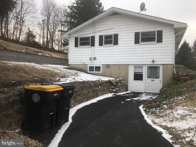 view of snow covered property