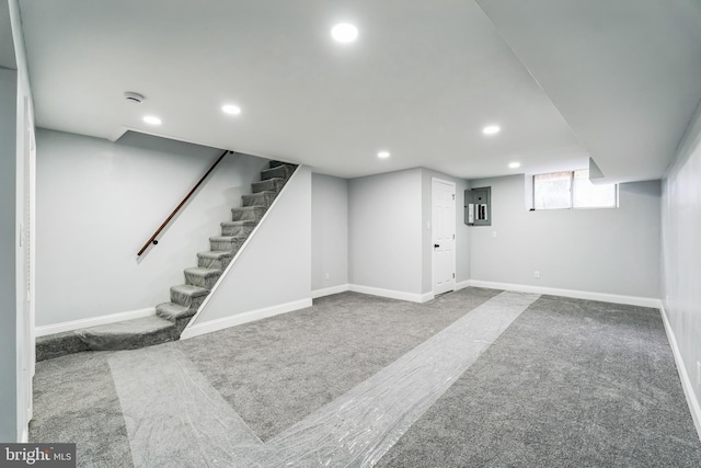 basement with recessed lighting, carpet flooring, and baseboards