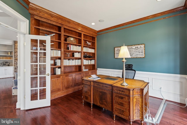 office with built in shelves, french doors, a wainscoted wall, crown molding, and wood finished floors