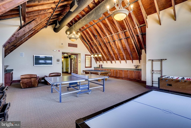 playroom with high vaulted ceiling, visible vents, and beamed ceiling