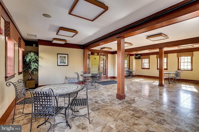 interior space with visible vents and outdoor dining space