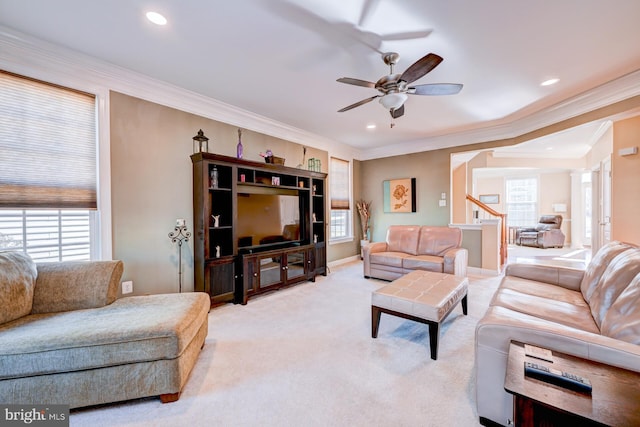 carpeted living room featuring ceiling fan, recessed lighting, a wealth of natural light, and crown molding