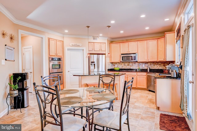 kitchen featuring a kitchen island, ornamental molding, appliances with stainless steel finishes, backsplash, and light brown cabinetry