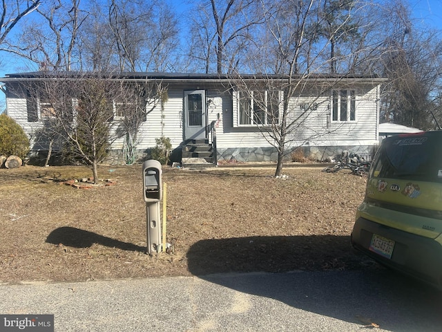 view of front of property with entry steps