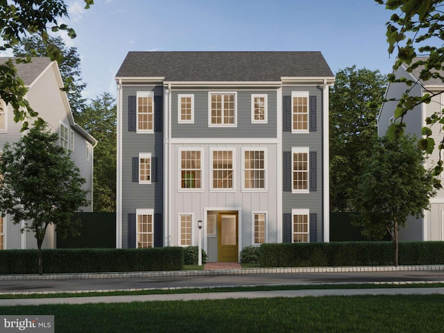 colonial-style house featuring board and batten siding