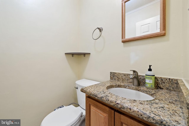 half bath with toilet and vanity