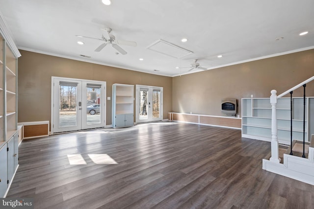 unfurnished living room featuring recessed lighting, french doors, crown molding, and wood finished floors