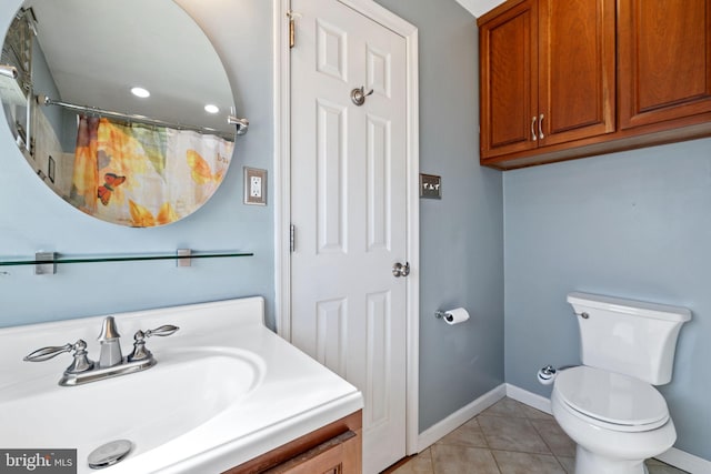 full bathroom with tile patterned floors, toilet, curtained shower, baseboards, and vanity