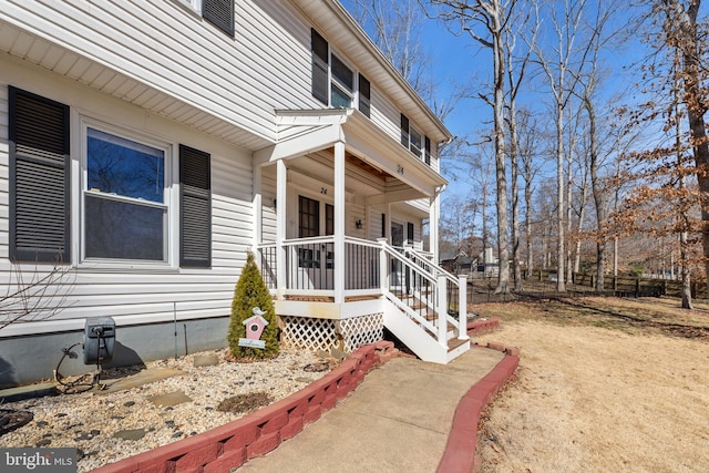 view of property exterior featuring a porch