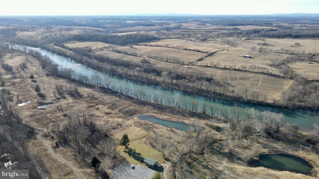 bird's eye view featuring a rural view and a water view