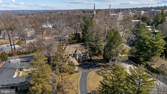 aerial view with a wooded view