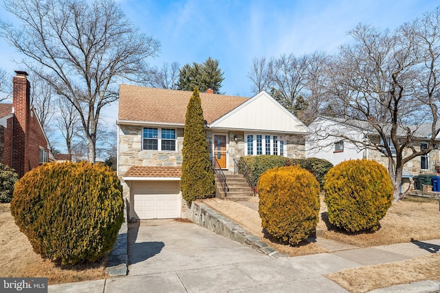 view of front of home featuring driveway, a garage, stone siding, a chimney, and roof with shingles