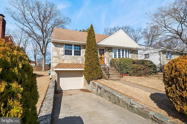 ranch-style house featuring stone siding, roof with shingles, driveway, and an attached garage