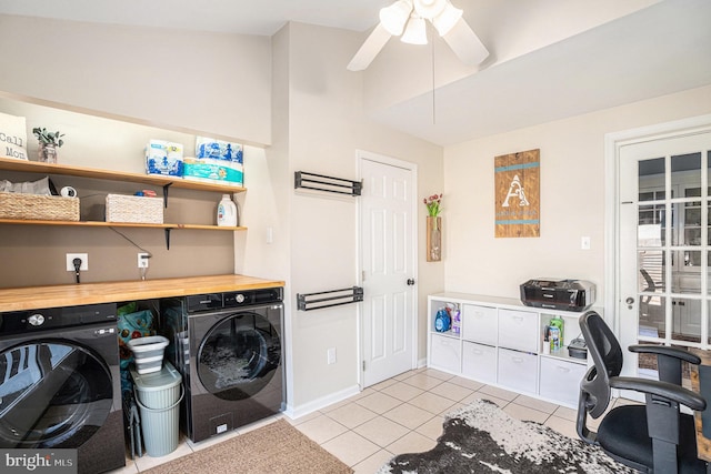 washroom featuring ceiling fan, light tile patterned flooring, laundry area, baseboards, and independent washer and dryer