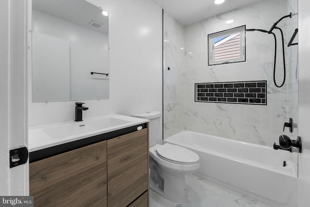 full bath with toilet, visible vents, vanity, marble finish floor, and washtub / shower combination