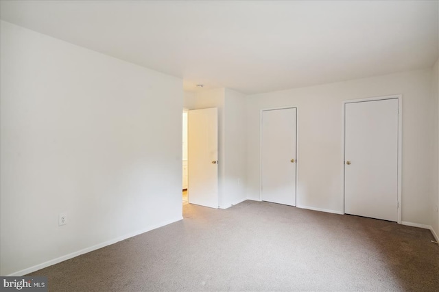 unfurnished bedroom with baseboards