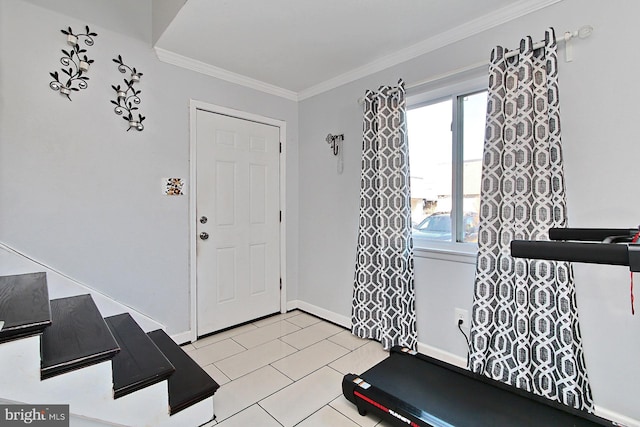 workout room featuring ornamental molding, baseboards, and light tile patterned floors