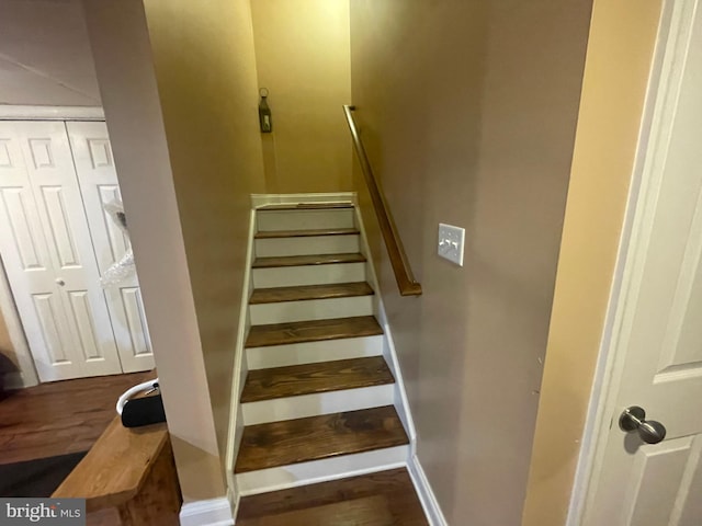 stairs featuring baseboards