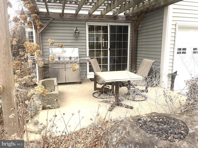 view of patio / terrace featuring outdoor dining space, area for grilling, and a pergola