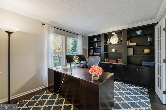 home office with dark wood-style floors, a textured ceiling, baseboards, and crown molding