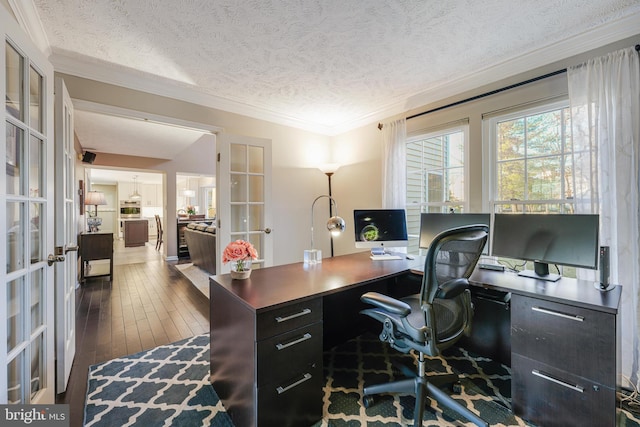 home office with a textured ceiling, french doors, ornamental molding, and wood-type flooring