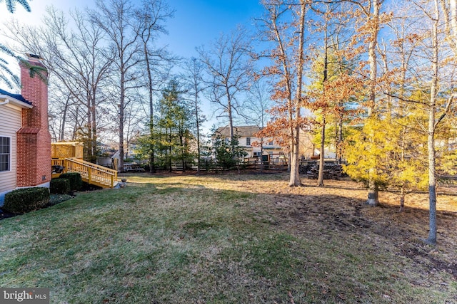 view of yard featuring fence