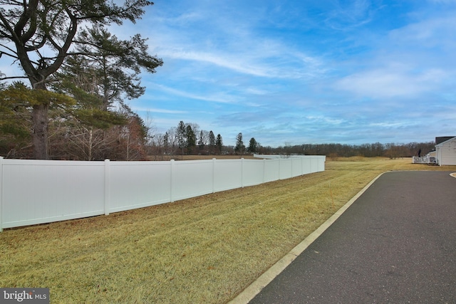 view of yard featuring fence