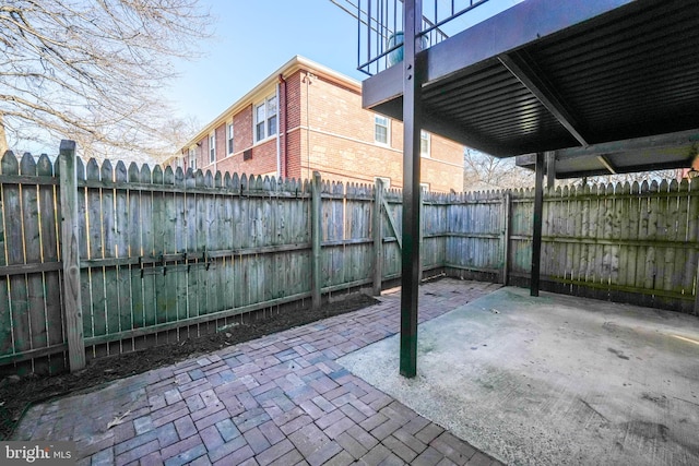 view of patio with a fenced backyard