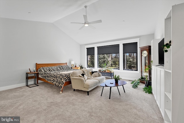 bedroom featuring baseboards, lofted ceiling, carpet, and a ceiling fan