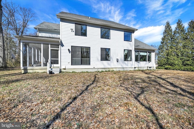 back of property featuring a sunroom