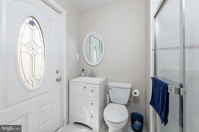 bathroom with toilet and vanity