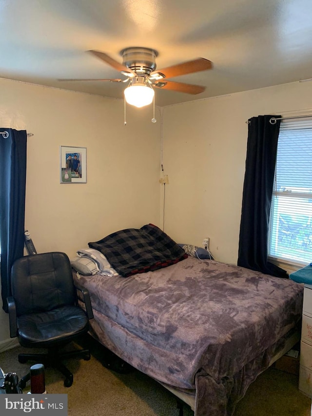 bedroom featuring a ceiling fan