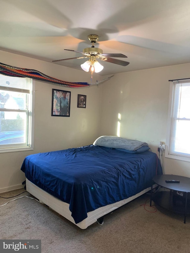 bedroom with carpet and ceiling fan