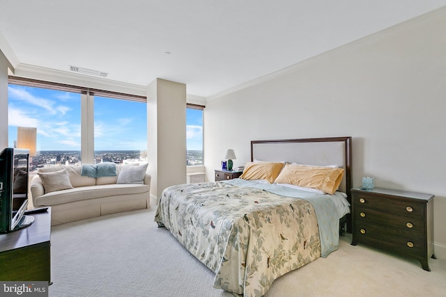 bedroom featuring light carpet, visible vents, and crown molding