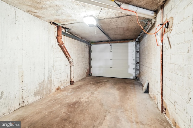 garage featuring concrete block wall